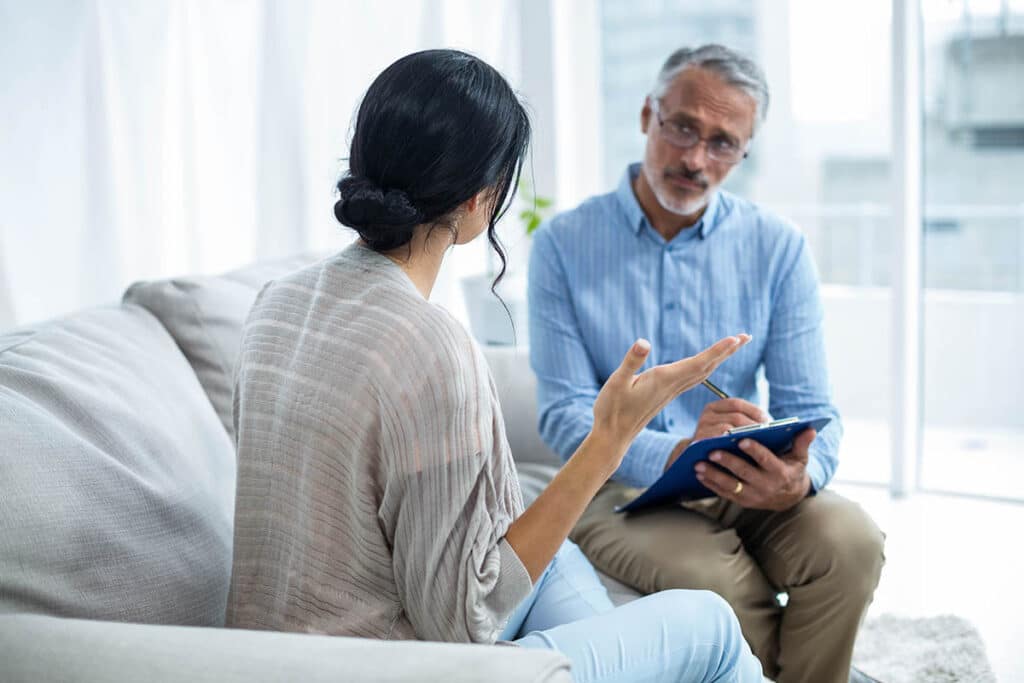 anxiety therapist listening to patient