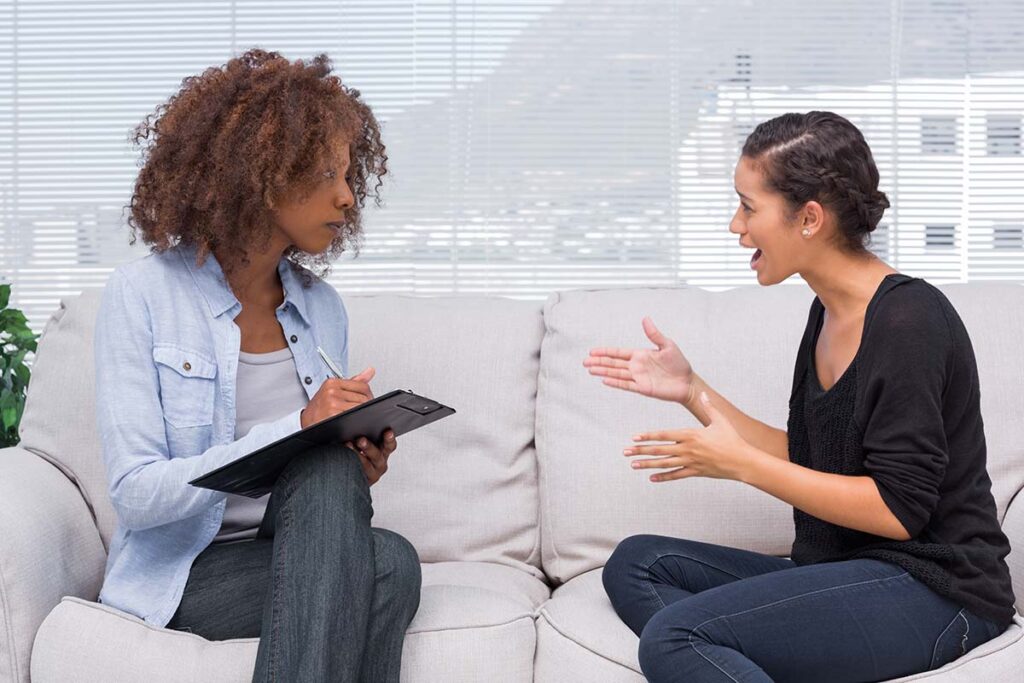 depression therapist working with patient