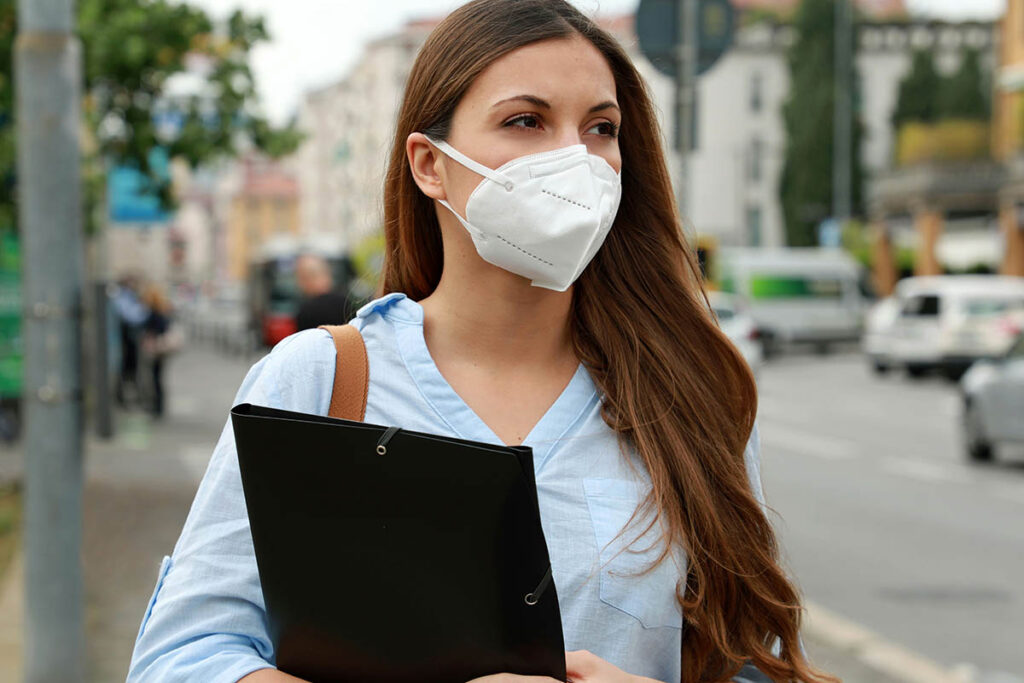 student wearing mask managing anxiety about COVID and returning to school