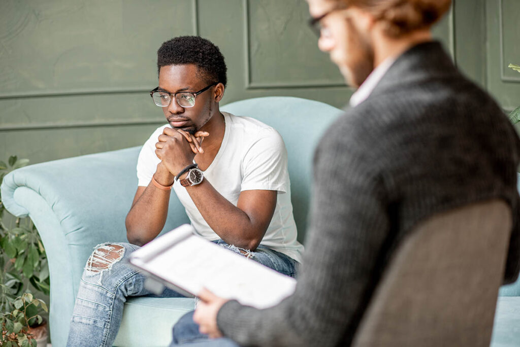 man speaking with his depression therapist near Cedar Brook NJ