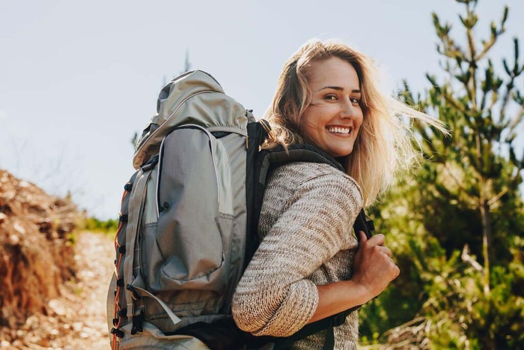 woman smiling showing how Hiking Improves Mental Health