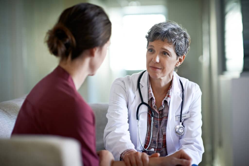 doctor speaking with a patient