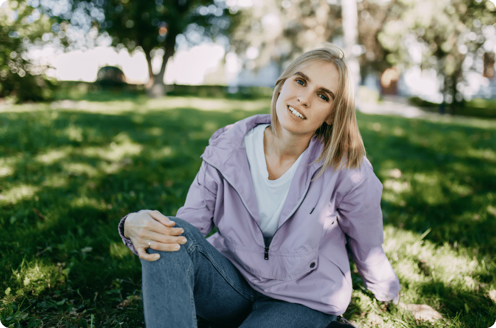 woman sitting on the grass